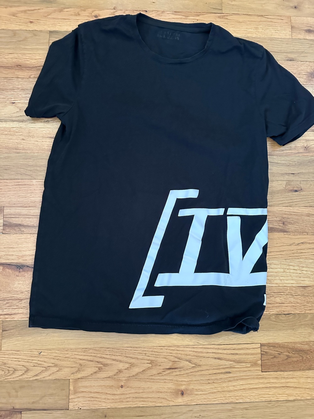 Black Short-Sleeve Graphic Tee with White Accent